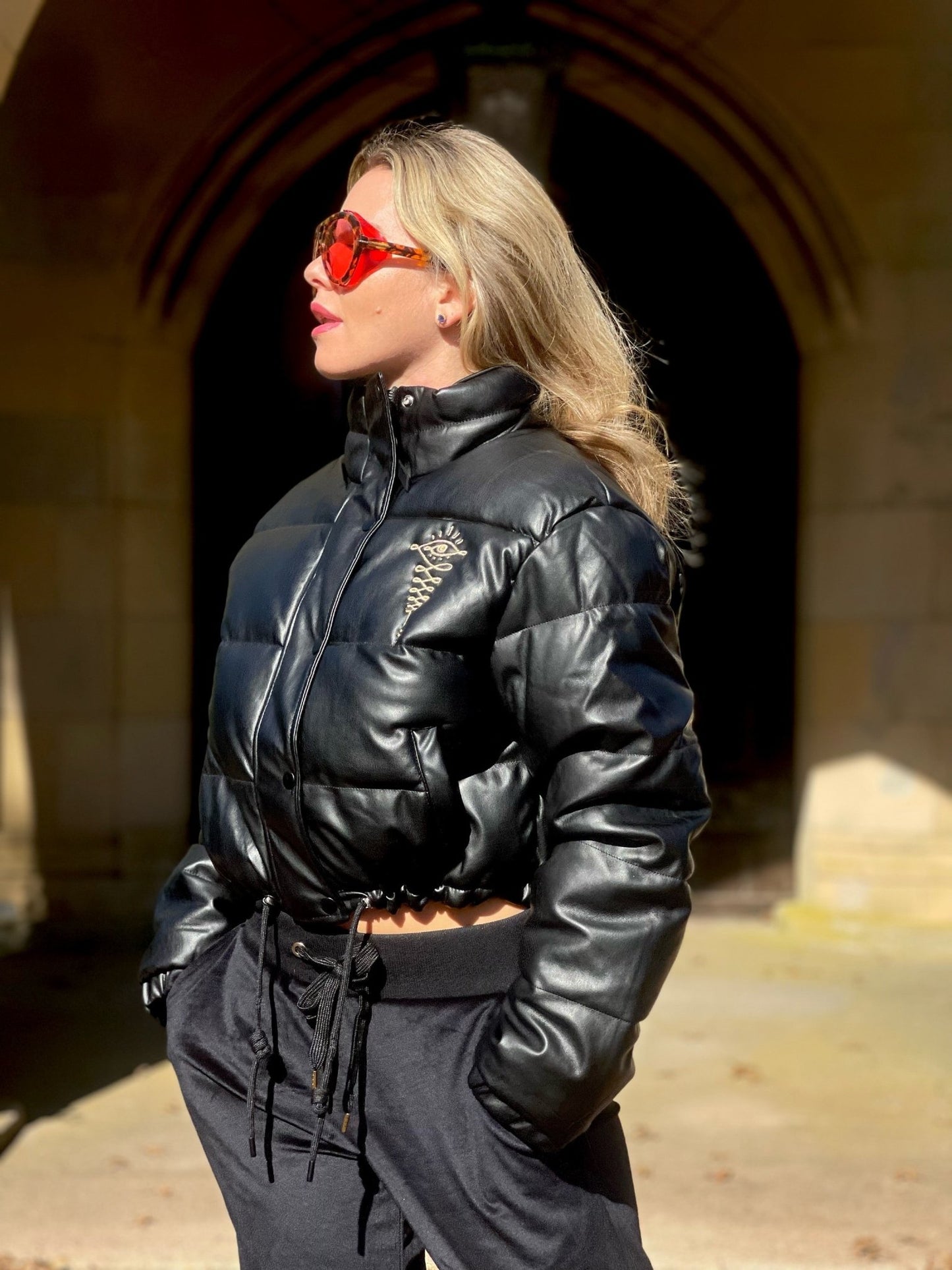 Embroidered Gold Eye Logo Shiny Faux Leather Puffer Jacket - Camaroha Sutra