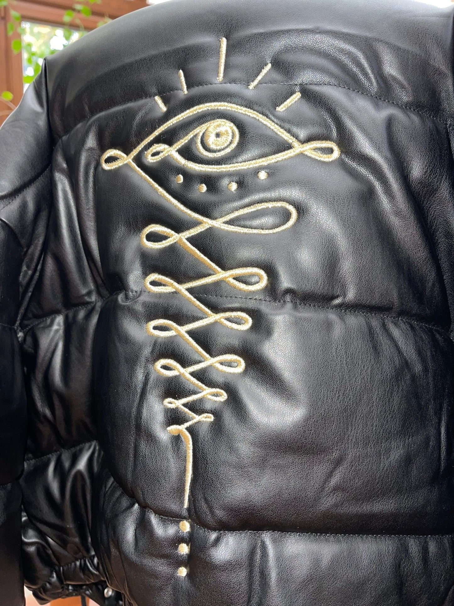 Embroidered Gold Eye Logo Shiny Faux Leather Puffer Jacket - Camaroha Sutra