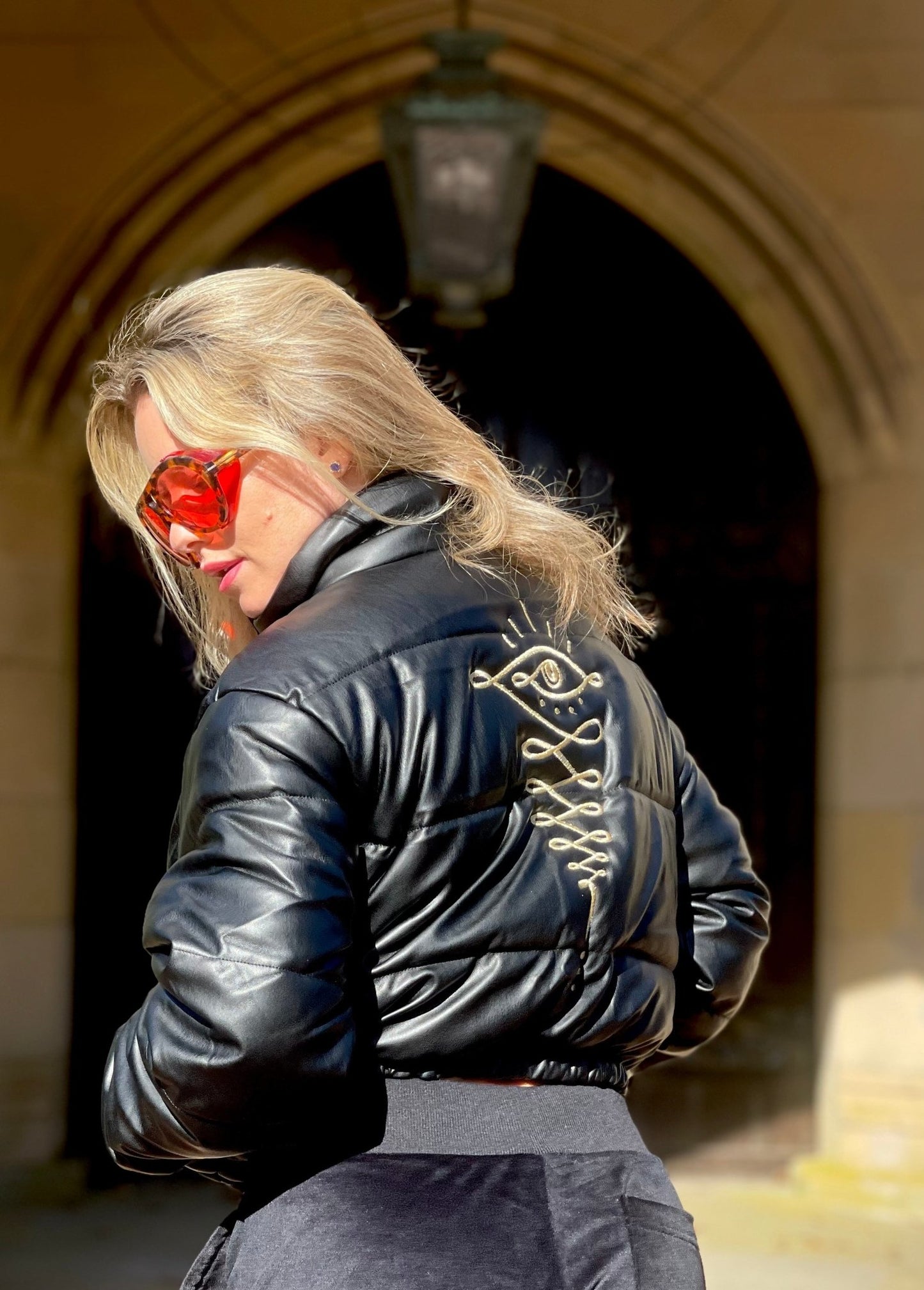 Embroidered Gold Eye Logo Shiny Faux Leather Puffer Jacket - Camaroha Sutra